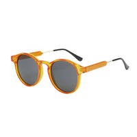 Transparent Amber Frame / Black Lens